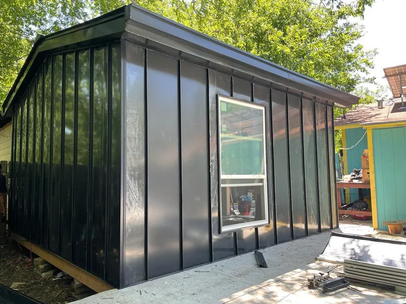 Black standing seam metal wall panels for Roof Inspection in Eagle Lake