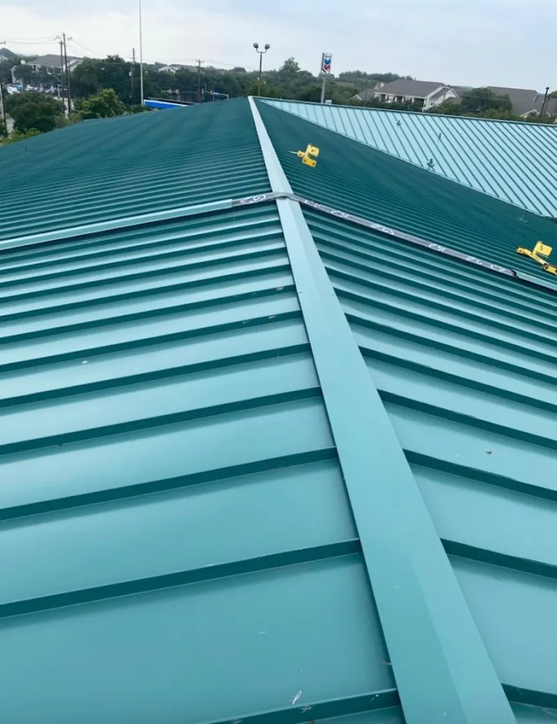 Green commercial metal roof ridge and valley for Metal Roof Repair in Eagle Lake