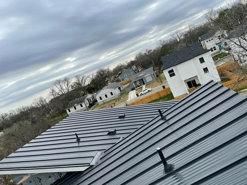 Standing seam metal roof panels with vents for Skylight Repair in Eagle Lake